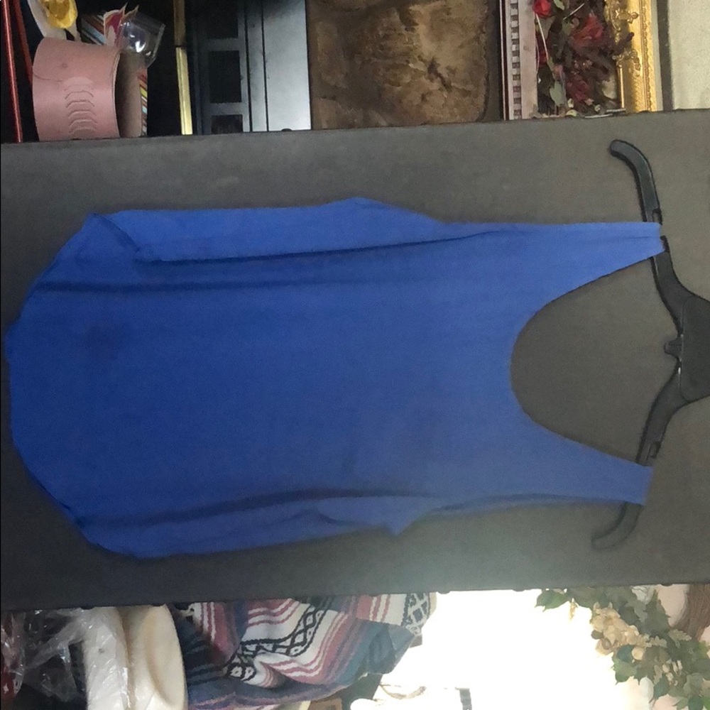 Blue tank top, with purple bows